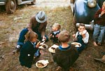 Children eating barbeque, Pie Town 1940
