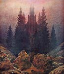 Cross and cathedral in the mountains Caspar David Friedrich