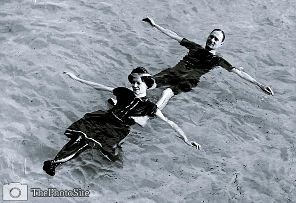 Floating on back in water early 20th century - Click Image to Close