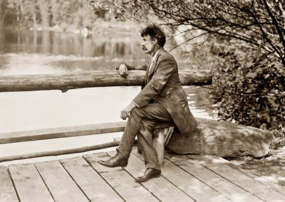 Ernest Thompson Seton portrait, sat on a bench