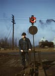 Railroad worker throwing a switch, Indiana Habor Belt