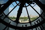 View through Orsay clock, across city of Paris
